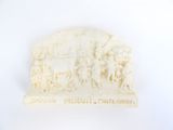 carved ivory plaque depicting a scene from the life of a roman soldier