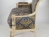 a chair that is sitting on a table in front of a book