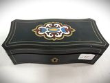an image of a black box with a gold and blue design on it