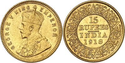 a gold coin with the image of a man wearing a crown