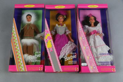 three barbie dolls are in a box with a comb and comb