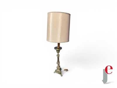 a lamp that is sitting on a table next to a lamp