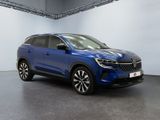 a blue 2020 kia kole suv parked in a showroom