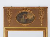 a mirror with a painting on it hanging on the wall