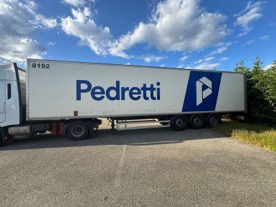 a semi truck that is parked on the side of the road