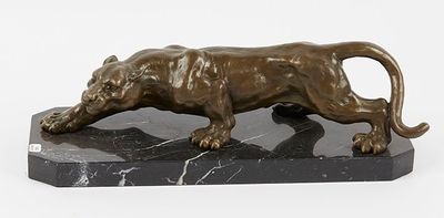 statue of a lion on a marble base on a white background
