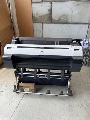an image of a large printer sitting on top of a table