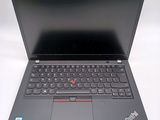 the laptop is open and ready to be used on the desk