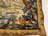 a picture of a tapestry hanging on a wall