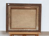 an old wooden easel with a painting on top of it
