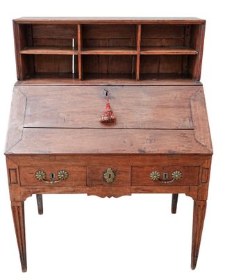an old wooden desk with drawers and drawers on top of it