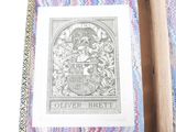 a picture of a book with a picture of a coat of arms on it