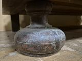 a close up of a vase sitting on the floor