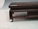 a small wooden box sitting on top of a table
