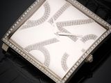 a close up of a watch with diamonds on the face