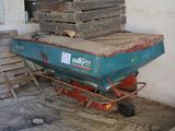 a blue cart with a pile of wooden pallets on it