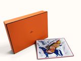 an orange box with a picture of a horse and a bird on it