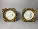 pair of blue and white porcelain vases with gold trim