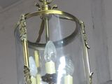 a light that is hanging from the ceiling in the room