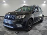 a picture of a black dacia parked on a checkered floor