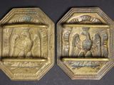 two antique brass plaques depicting the virgin and child jesus