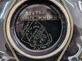 a close up of a clock on a glass plate