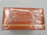 a close up of a box of soap on a white surface