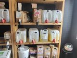 many containers and containers on the shelves in the room