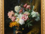 une peinture de fleurs dans un vase sur une table