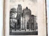 un vieux livre avec, au milieu, l'image d'une église