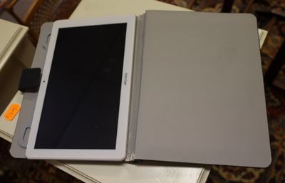 a tablet that is sitting on top of a table