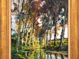 a painting of trees and water in a gold frame