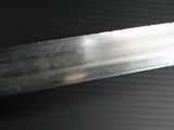 a large knife that is laying on a table