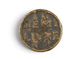 an old bronze coin with a roman inscription on it