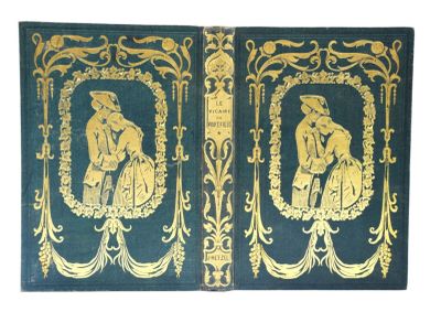 un vieux livre sur lequel figurent deux images représentant un homme et une femme