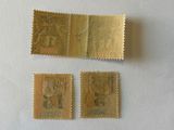 three stamps with a picture of a man and a woman on them