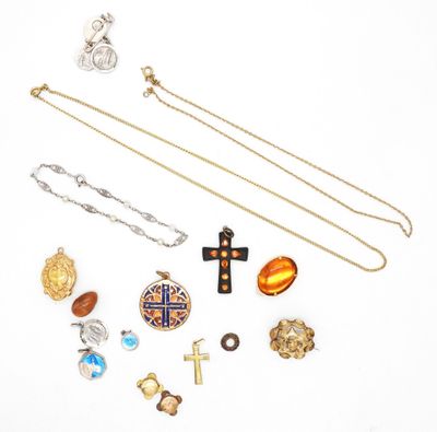several different types of jewelry are arranged on a white surface