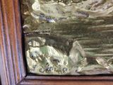 a close up of a bronze statue of a man and a dog