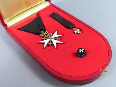 a red case with a star and other items in it