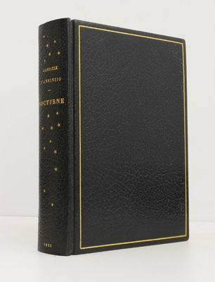 a black book with gold trim and a gold star on the cover
