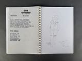 an open book with a drawing of a man standing on a skateboard