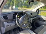 a picture of a car with a steering wheel and dashboard