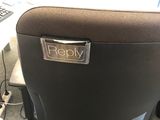 an image of a chair with a name plate on it