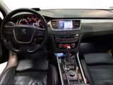 a picture of the interior of a car with a steering wheel and dashboard