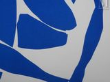 a picture of a blue and white painting on a wall