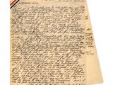 un vieux bout de papier sur lequel figurent des notes manuscrites