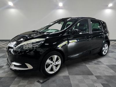 a picture of a black car parked on a checkered floor