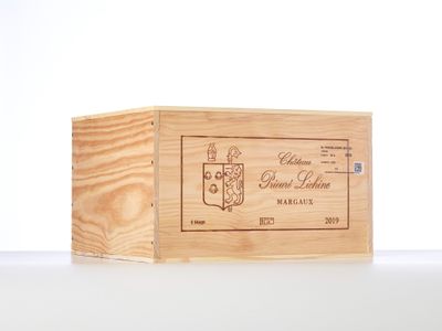 a wooden box that has a wine label on it