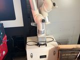 a robot that is sitting on top of a box