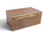 a brown box that is sitting on a white surface